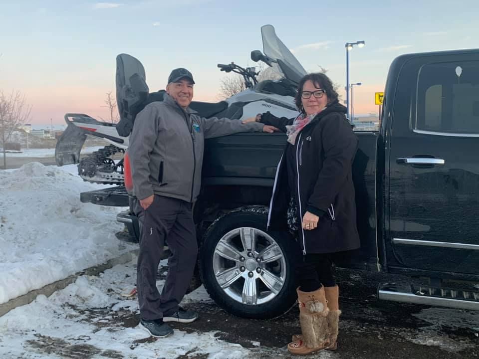 Customer with their new snowmobile