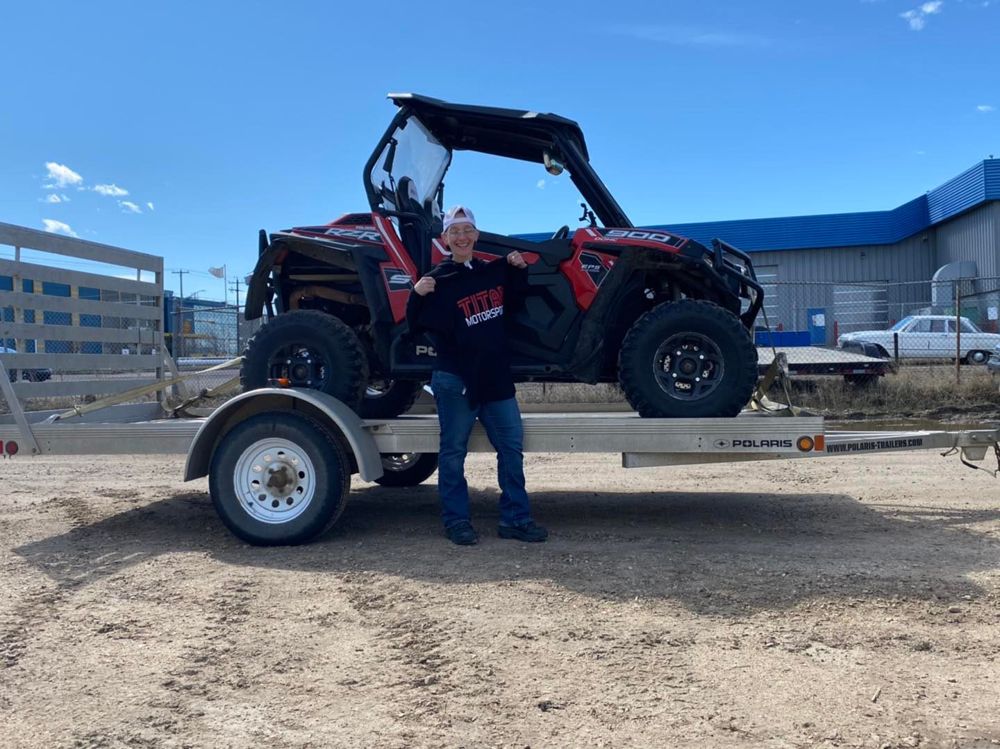 Wide Open Approvals customer with their new Polaris RZR side-by-side