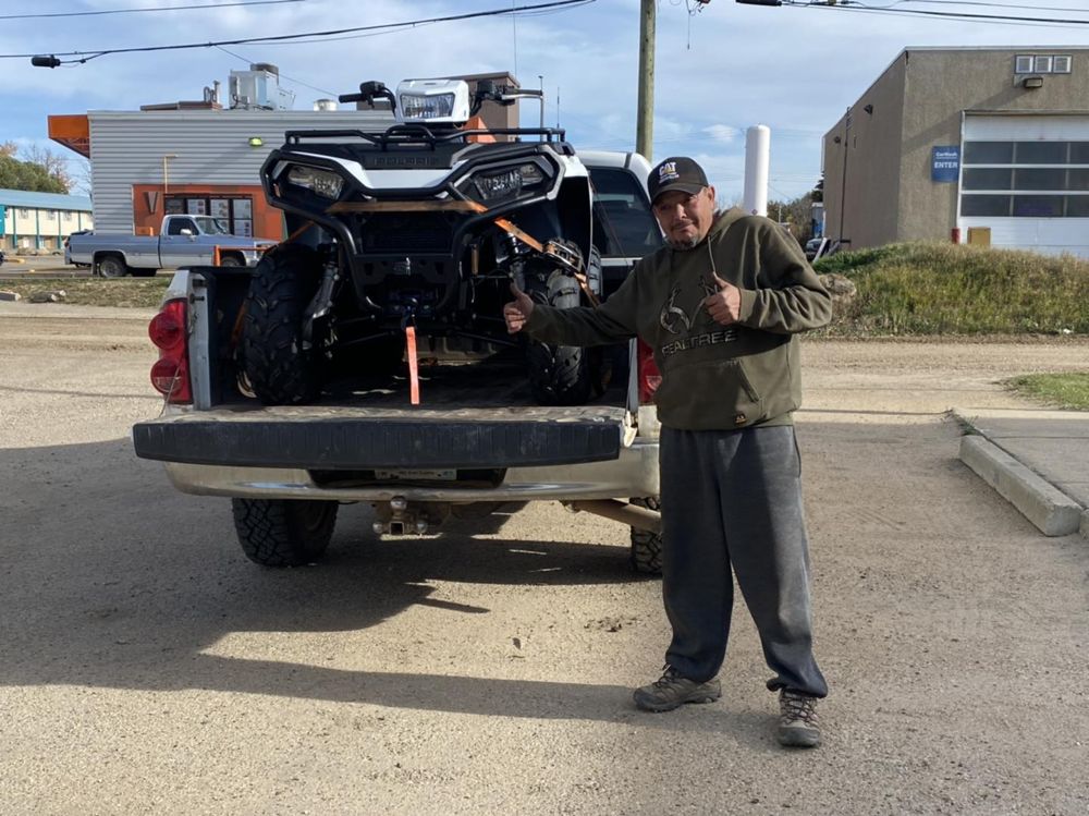 Wide Open Approvals customer with their new Polaris ATV