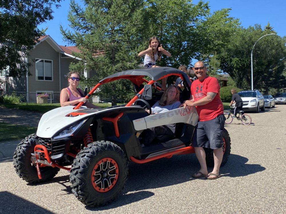 Family with their new Segway side-by-side