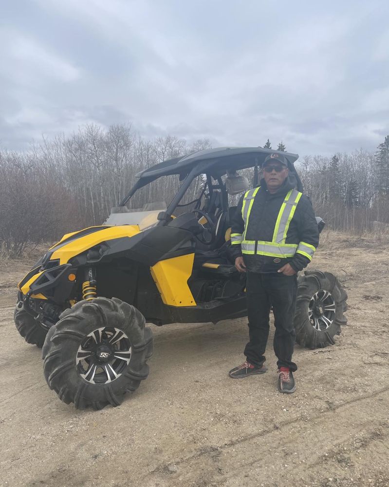 Customer with their new Can-Am Maverick side-by-side