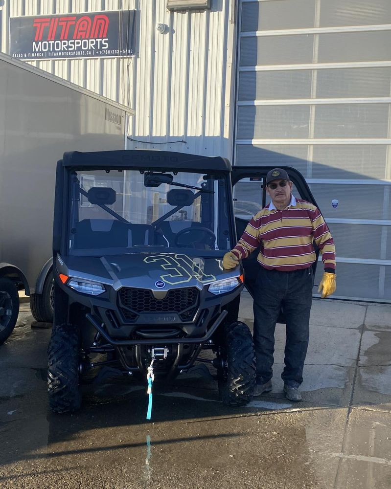 Wide Open Approvals customer with their new CFMoto side-by-side at Titan Motorsports